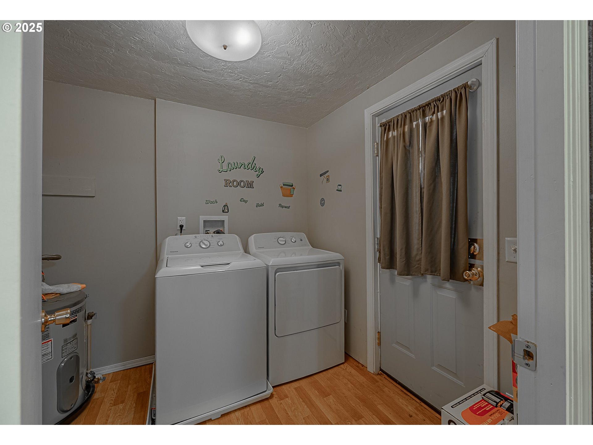 150 North 11th Street Lakeside, OR 97449 - Photo 31 of 37 a utility room with dryer and washer