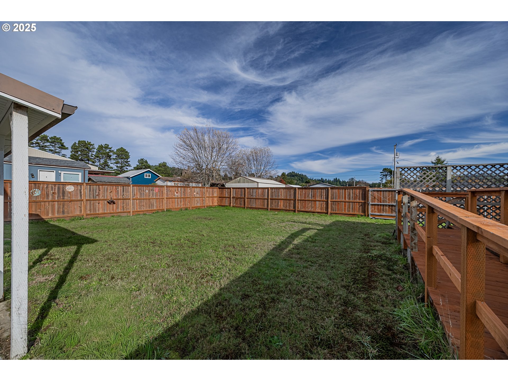 150 North 11th Street Lakeside, OR 97449 - Photo 33 of 37 a view of a backyard with a garden