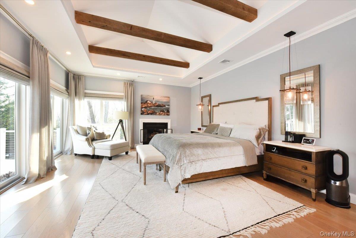 5 Coon Hollow Road Lloyd Harbor, NY 11743 - Photo 18 of 43 a bed room with a bed and a couch