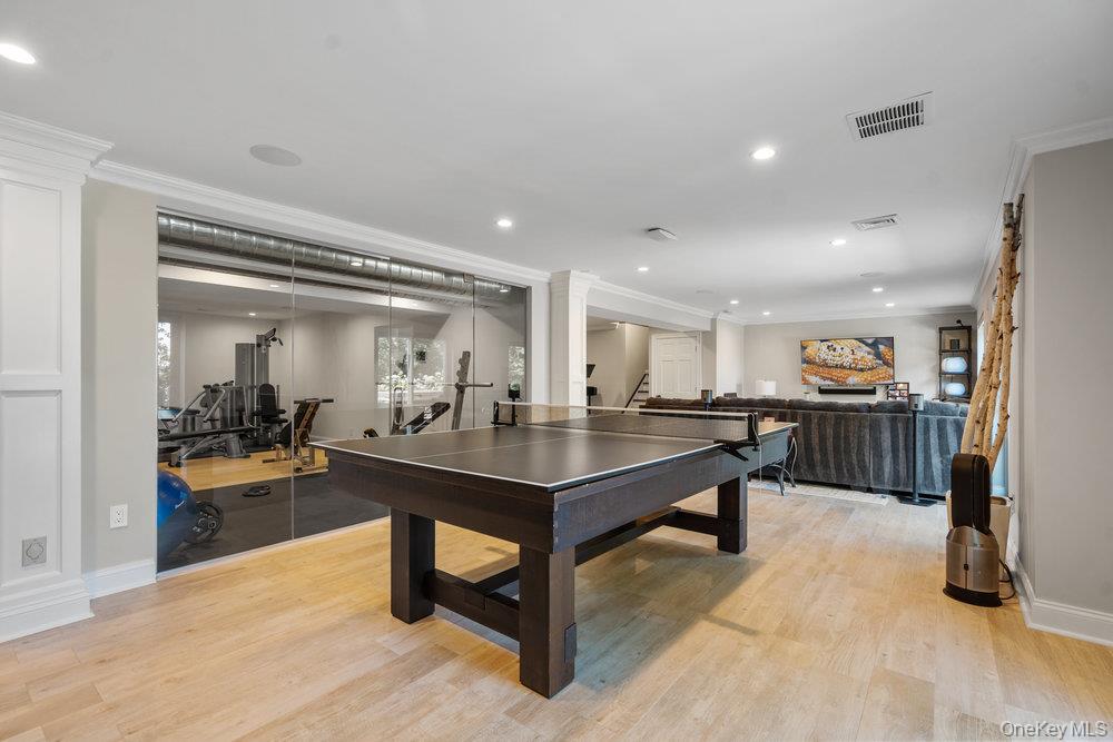 5 Coon Hollow Road Lloyd Harbor, NY 11743 - Photo 30 of 43 a view of a room with gym equipment