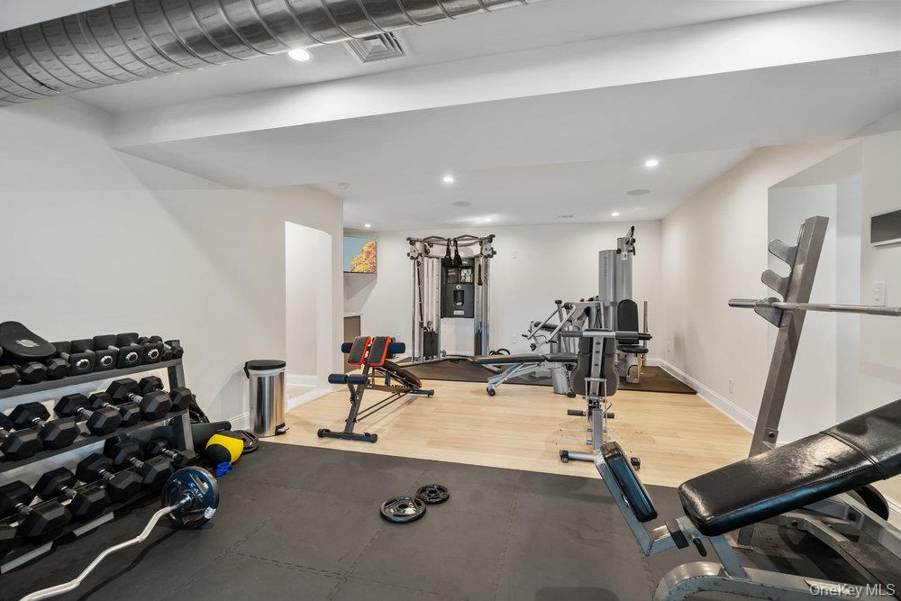 5 Coon Hollow Road Lloyd Harbor, NY 11743 - Photo 32 of 43 a view of a room with gym equipment