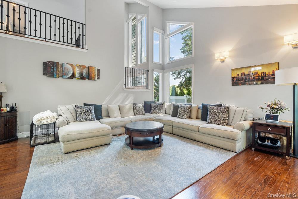 5 Coon Hollow Road Lloyd Harbor, NY 11743 - Photo 6 of 43 a living room with furniture and a large window