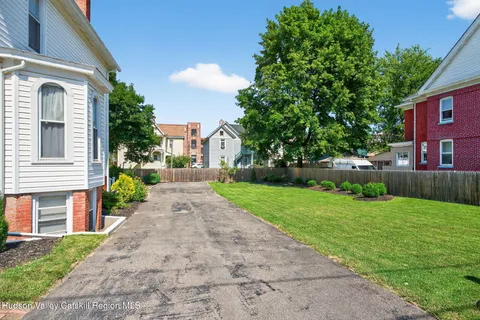 a garden with wooden fence