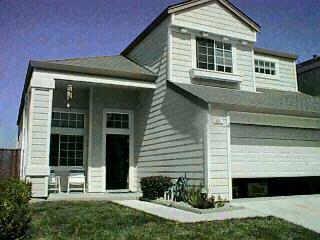 657 Powderhorn Avenue Santa Rosa, CA 95407 - Photo 2 of 2 a view of a house with a yard