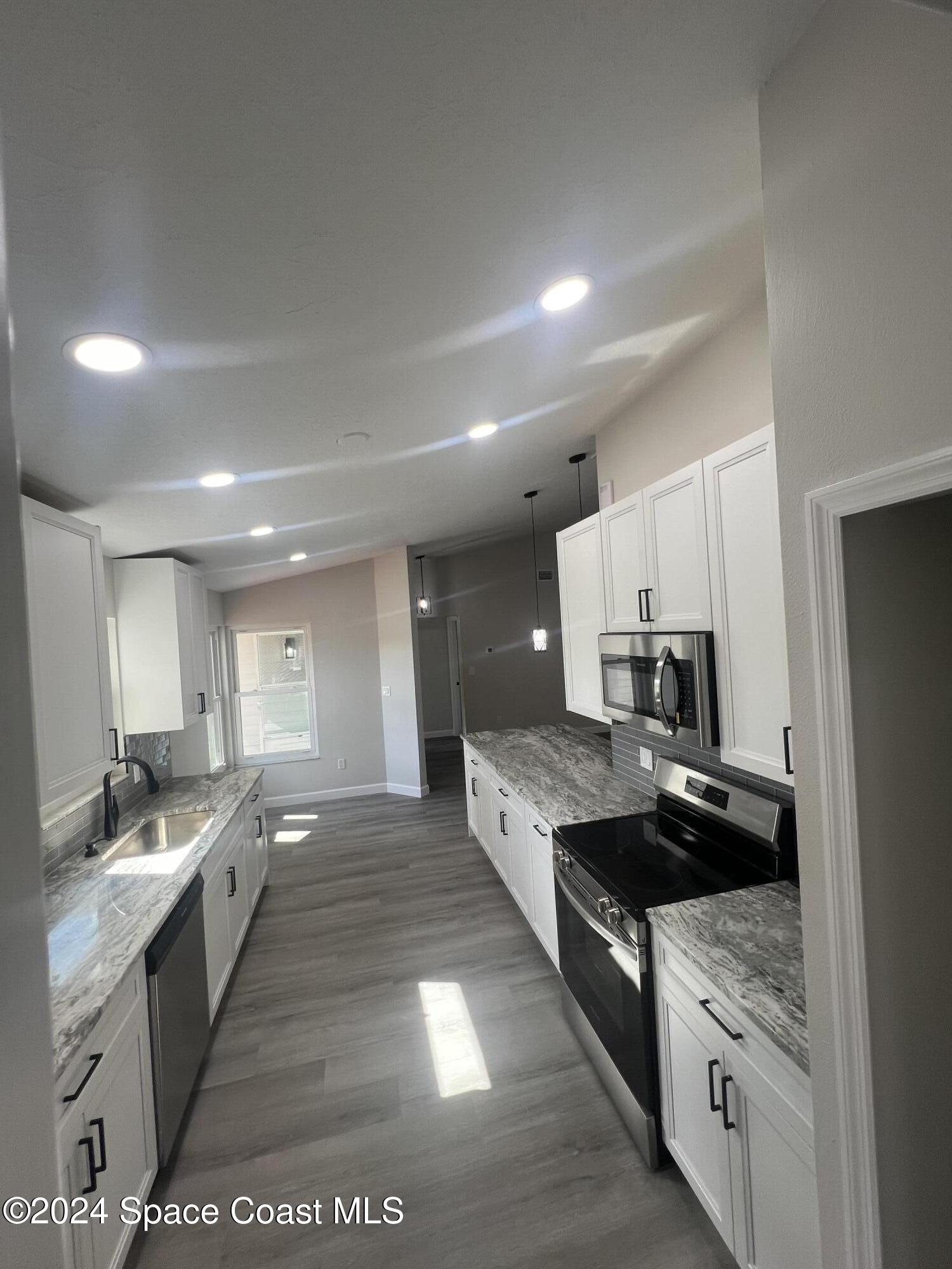379 Sauders Road Southeast Palm Bay, FL 32909 - Photo 6 of 64 20241115_175253428_iOS