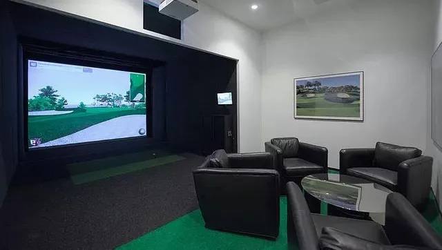 a living room with furniture and a garden