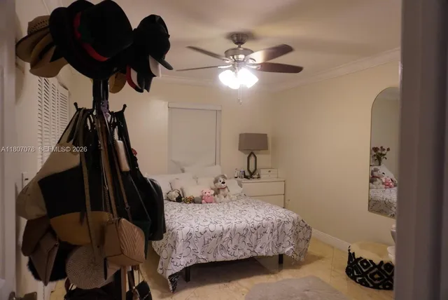 a bedroom with a bed and closet