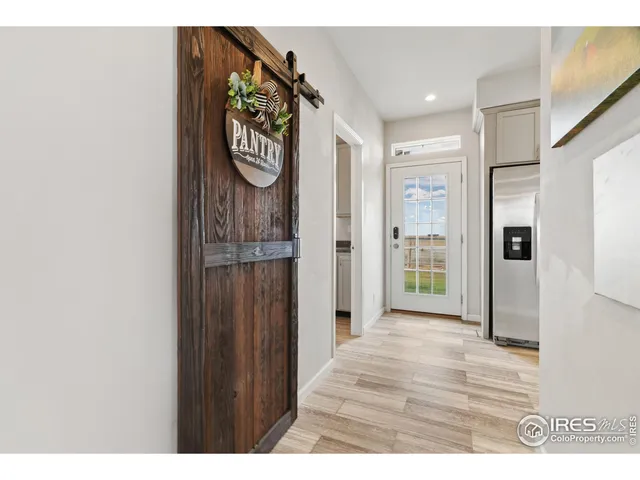 a view of a hallway with elevator