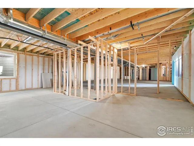 a view of a room with wooden walls