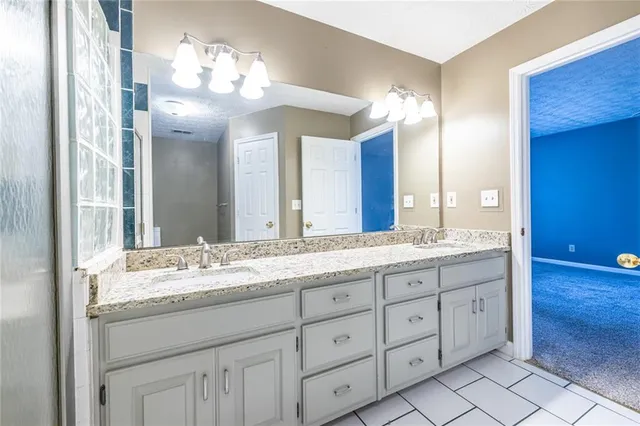 a view of a livingroom with a furniture and a large window