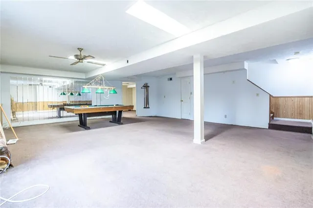 a view of backyard and trees