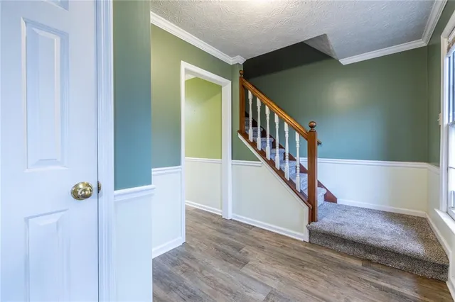a bathroom with a sink toilet and mirror