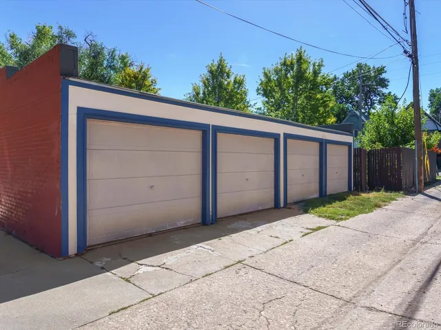 a view of backyard and garage