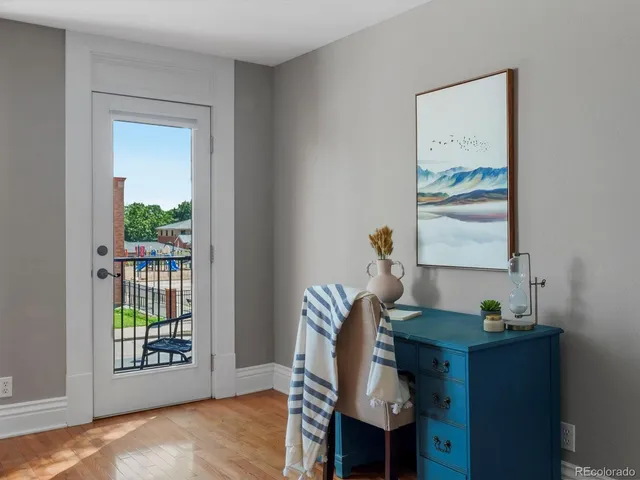 a workspace with furniture and window