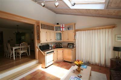 190 Captain Samadrus Road Cotuit, MA 02635 - Photo 6 of 15 a kitchen with stainless steel appliances kitchen island granite countertop a refrigerator and a stove