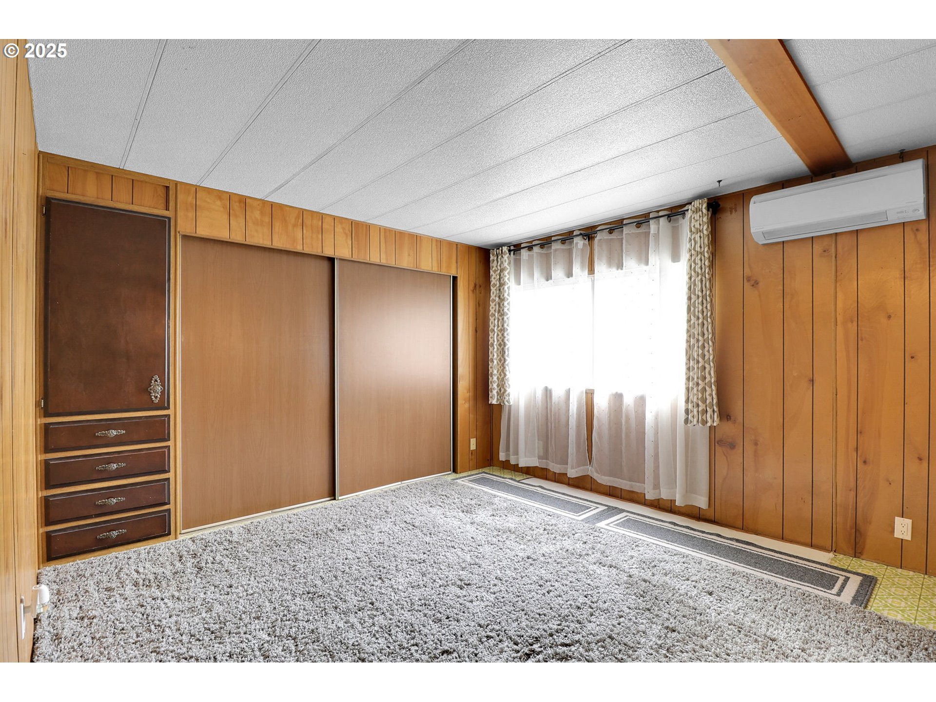 3900 Coburg Road, Unit 59 Eugene, OR 97408 - Photo 16 of 30 a view of an empty room with a window