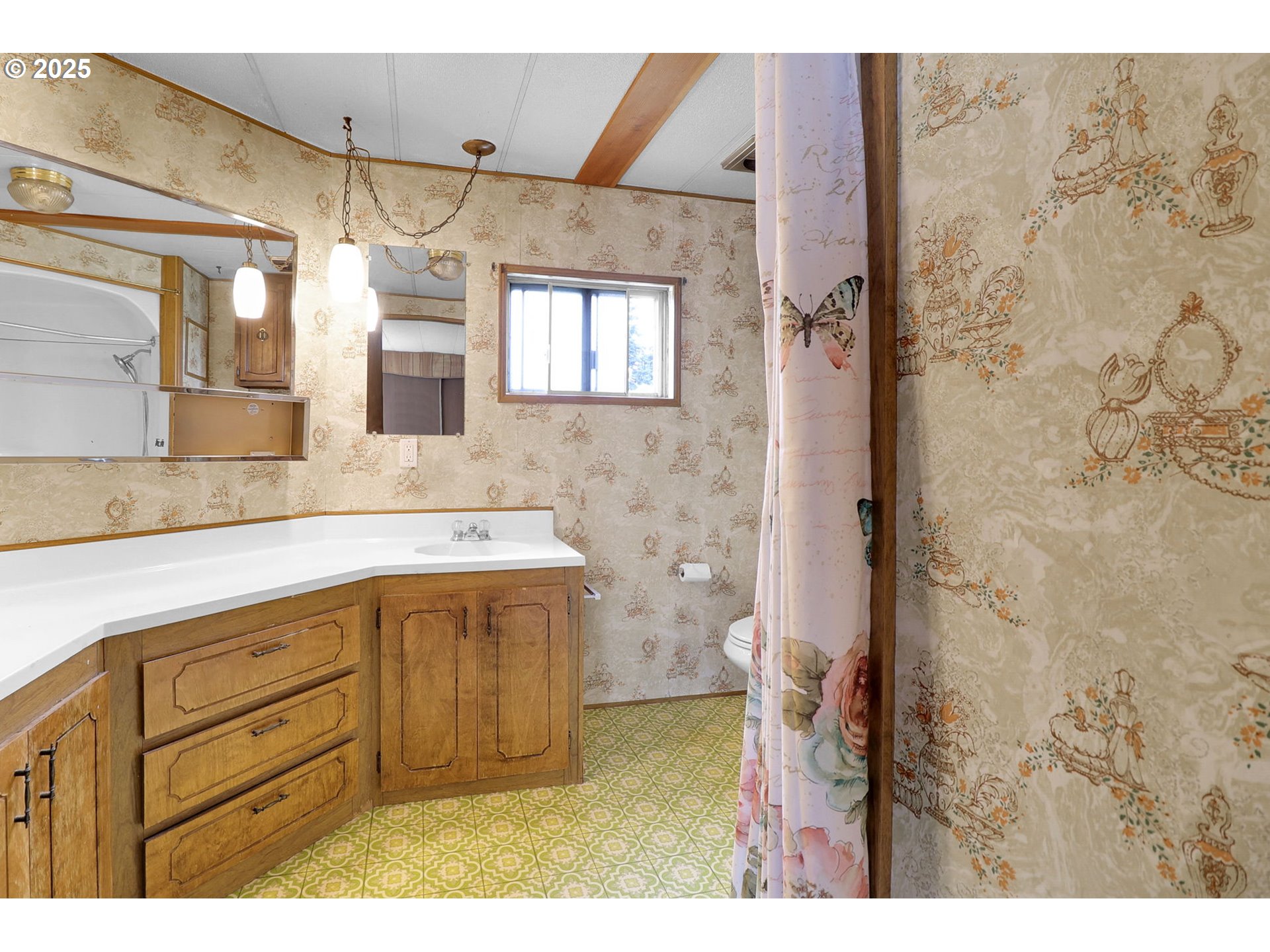 3900 Coburg Road, Unit 59 Eugene, OR 97408 - Photo 19 of 30 a spacious bathroom with a granite countertop sink a mirror and shower