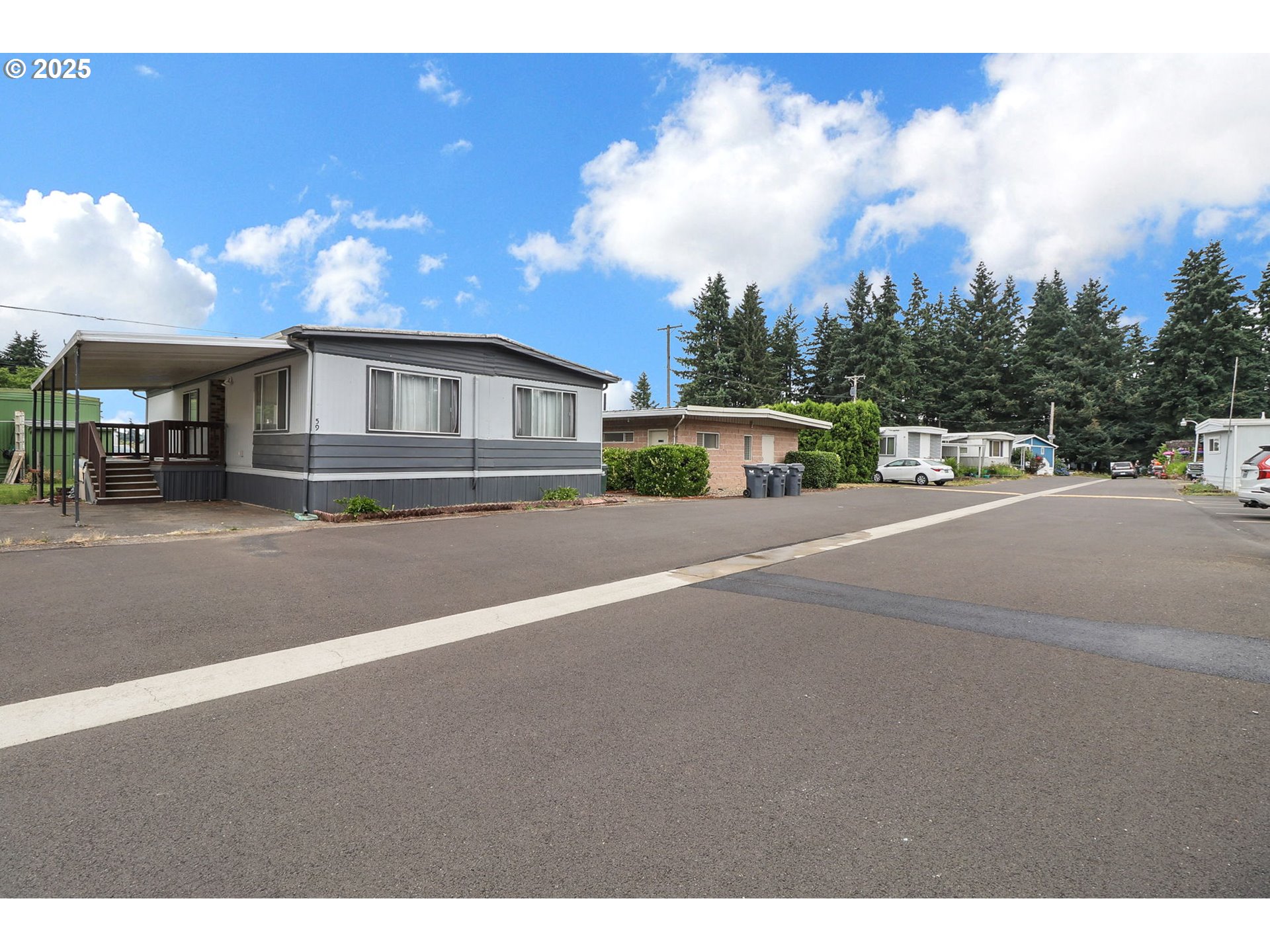 3900 Coburg Road, Unit 59 Eugene, OR 97408 - Photo 28 of 30 a house view with a street sign