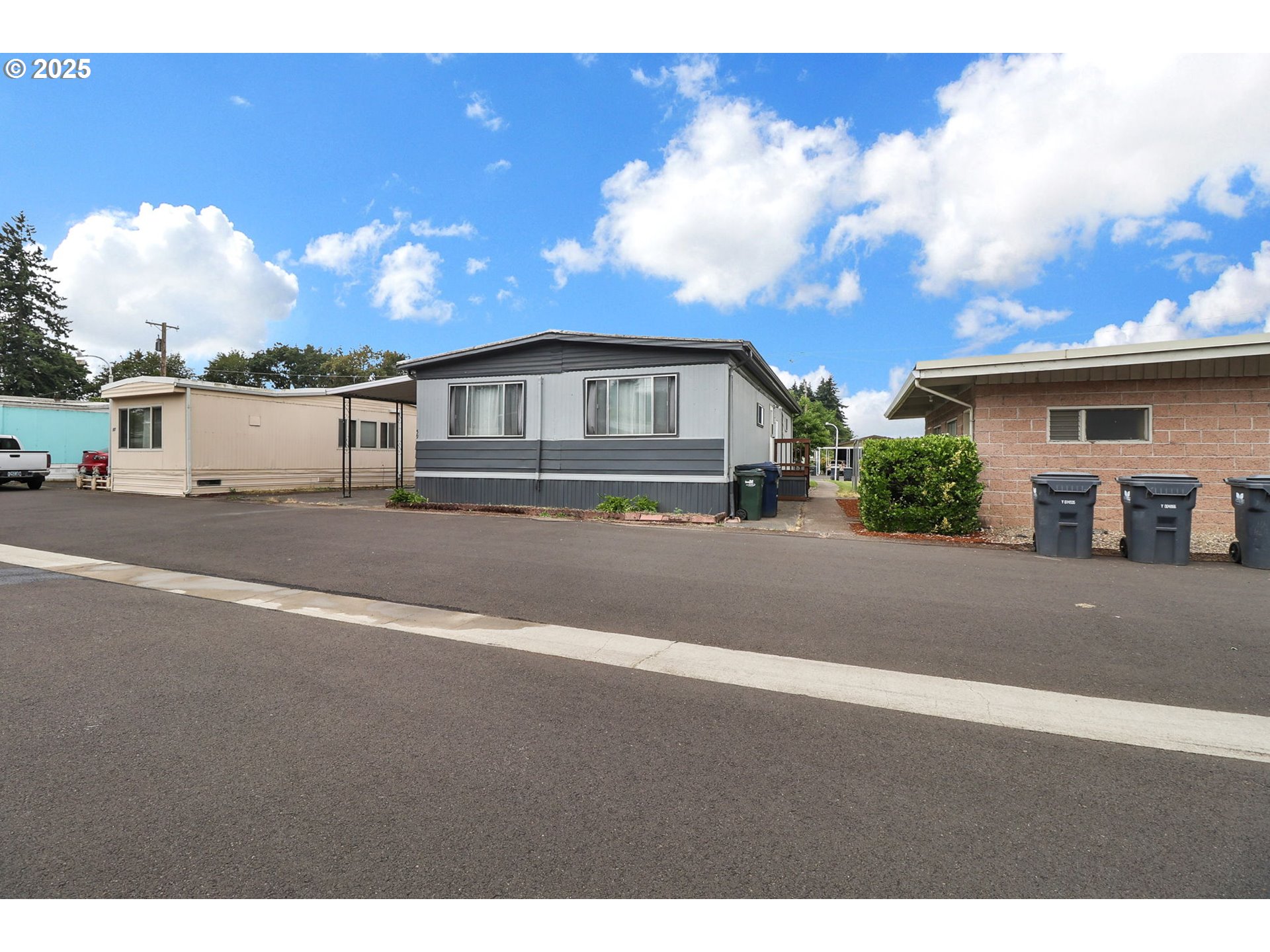 3900 Coburg Road, Unit 59 Eugene, OR 97408 - Photo 29 of 30 a view of a house with a yard