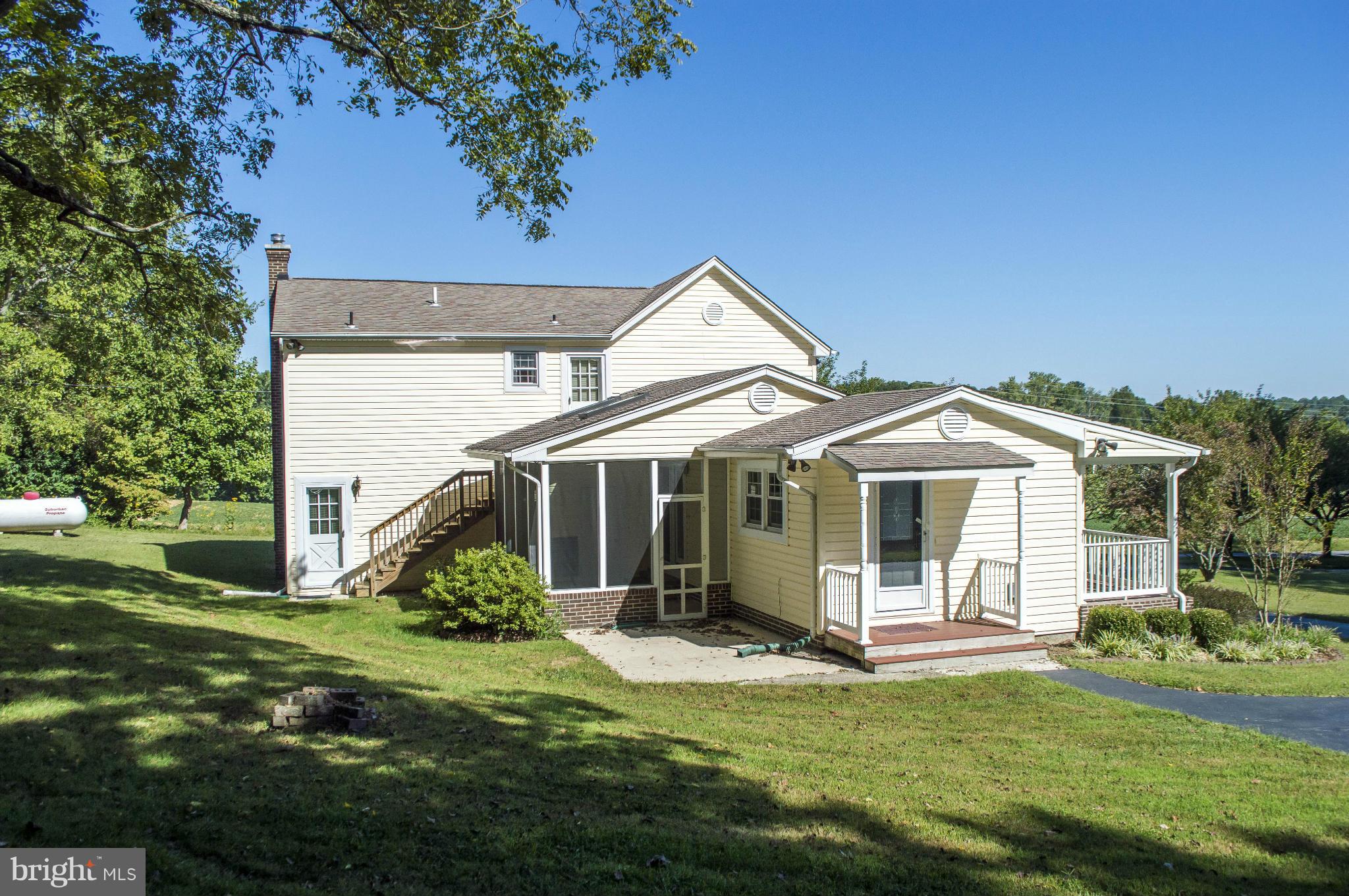 2050 Holland Cliffs Road Huntingtown, MD 20639 - Photo 3 of 29 a view of a house with backyard and porch