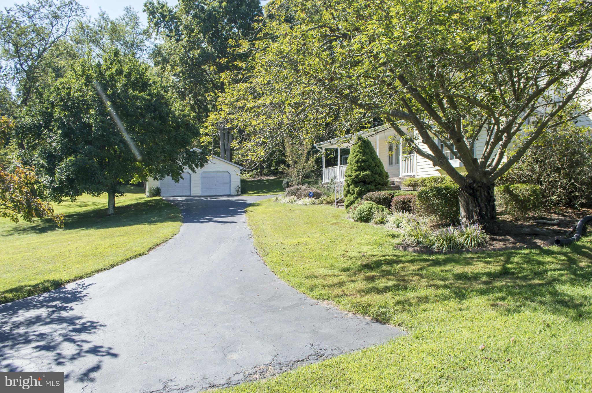 2050 Holland Cliffs Road Huntingtown, MD 20639 - Photo 6 of 29 a view of a park with large trees