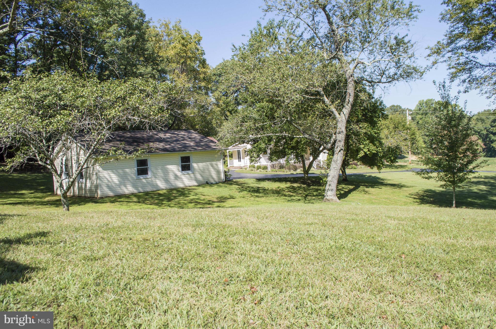 2050 Holland Cliffs Road Huntingtown, MD 20639 - Photo 10 of 29 a view of a house with a yard