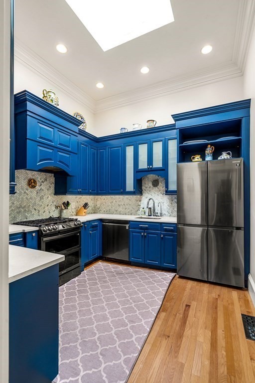 10 Forrester Street, Unit 2 Salem, MA 01970 - Photo 15 of 40 a kitchen with stainless steel appliances granite countertop a refrigerator a stove and a sink