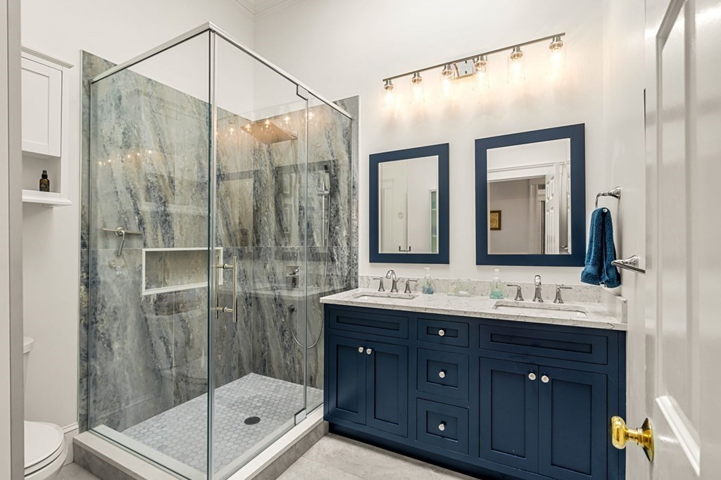 10 Forrester Street, Unit 2 Salem, MA 01970 - Photo 21 of 40 a bathroom with a double vanity sink mirror and shower