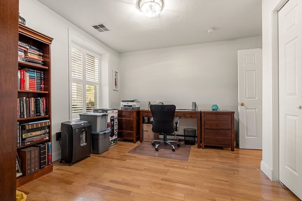 10 Forrester Street, Unit 2 Salem, MA 01970 - Photo 26 of 40 a view of a workspace with furniture and a window