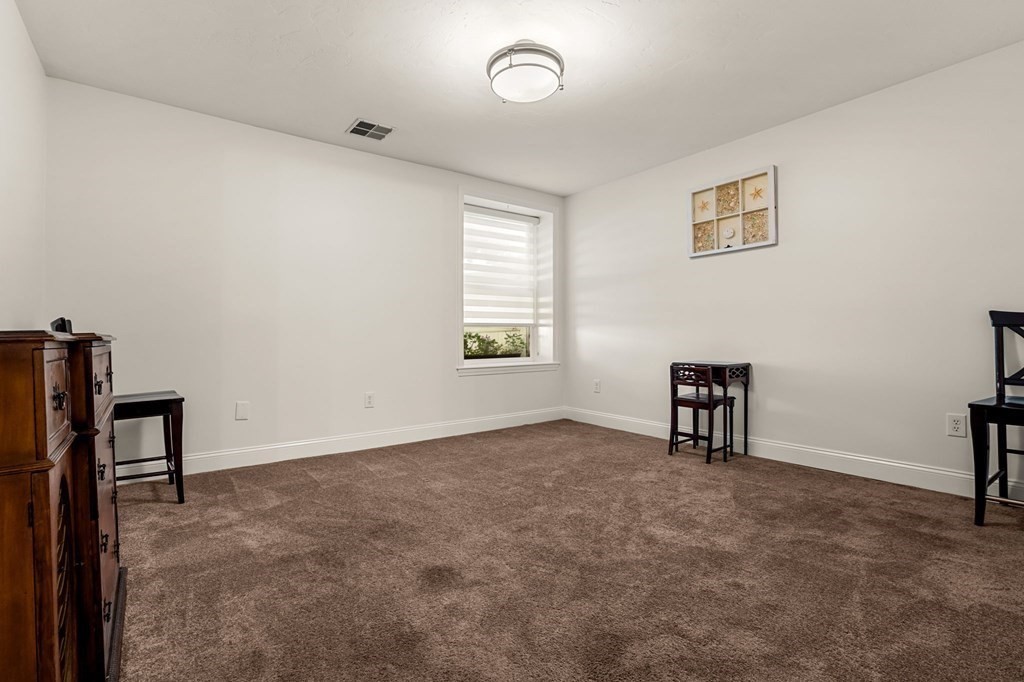 10 Forrester Street, Unit 2 Salem, MA 01970 - Photo 28 of 40 a view of an empty room with a window