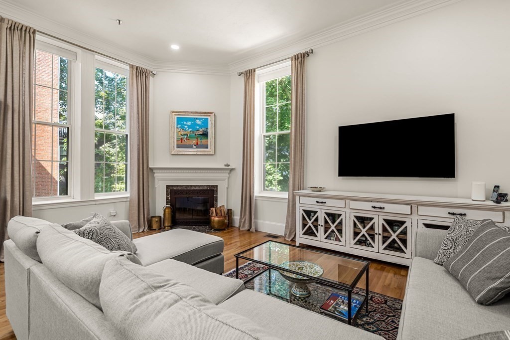 10 Forrester Street, Unit 2 Salem, MA 01970 - Photo 3 of 40 a living room with furniture fireplace and flat screen tv