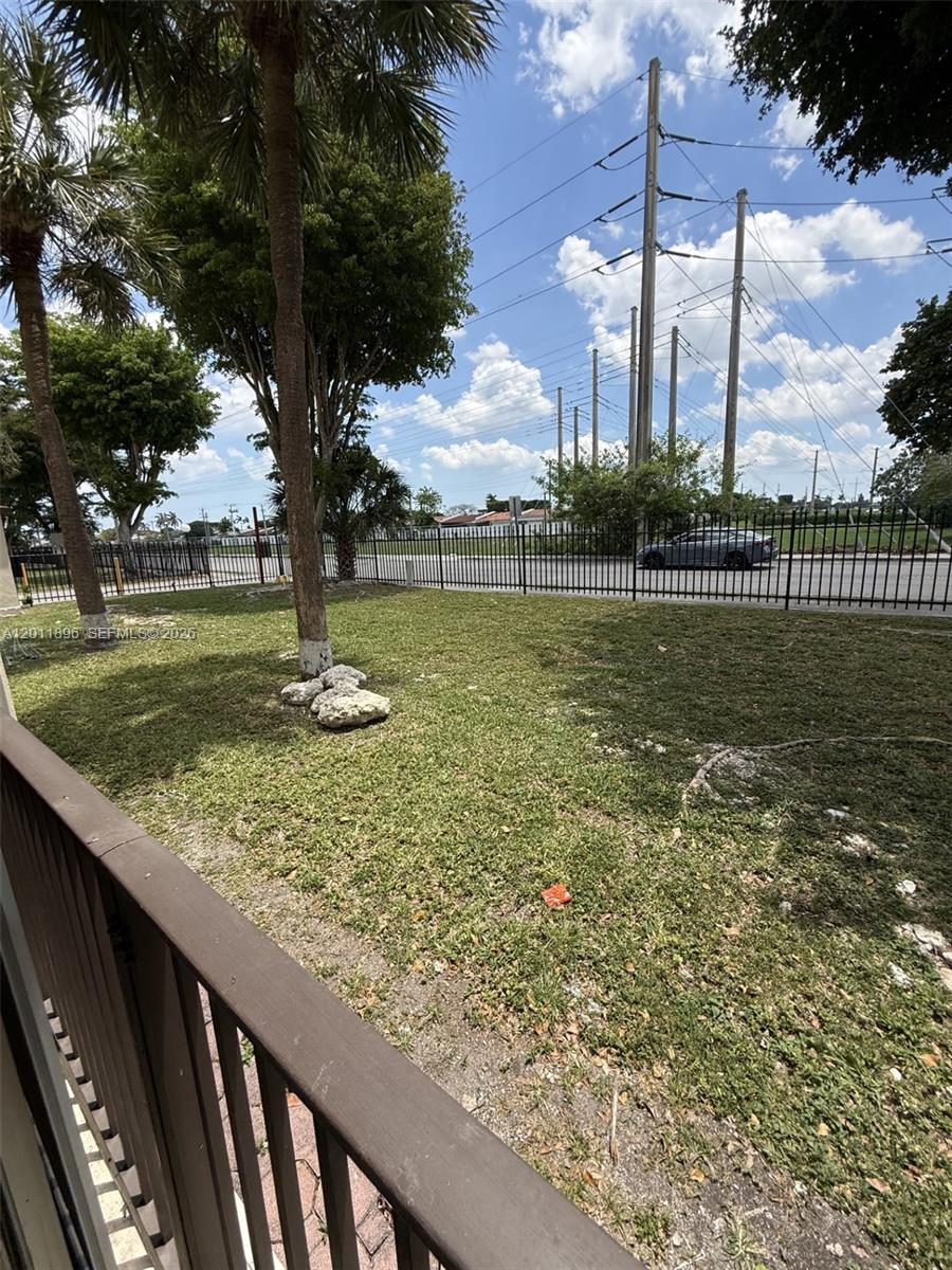 9411 Southwest 4th Street, Unit 111 Miami, FL 33174 - Photo 15 of 20 a view of a garden with a tree