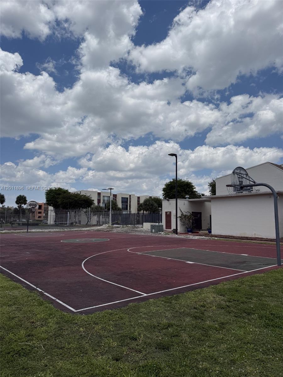 9411 Southwest 4th Street, Unit 111 Miami, FL 33174 - Photo 18 of 20 a view of a basketball court
