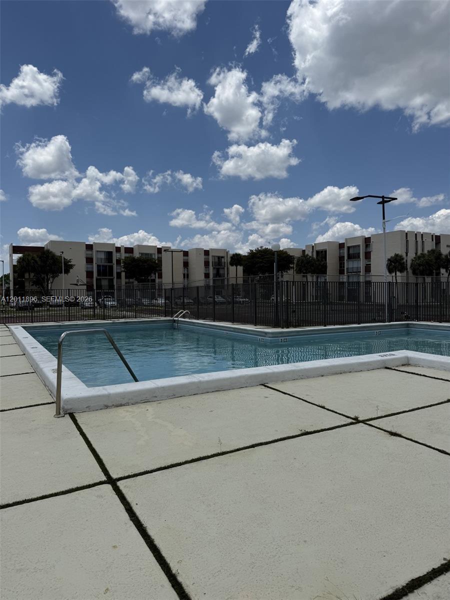 9411 Southwest 4th Street, Unit 111 Miami, FL 33174 - Photo 19 of 20 a view of a terrace