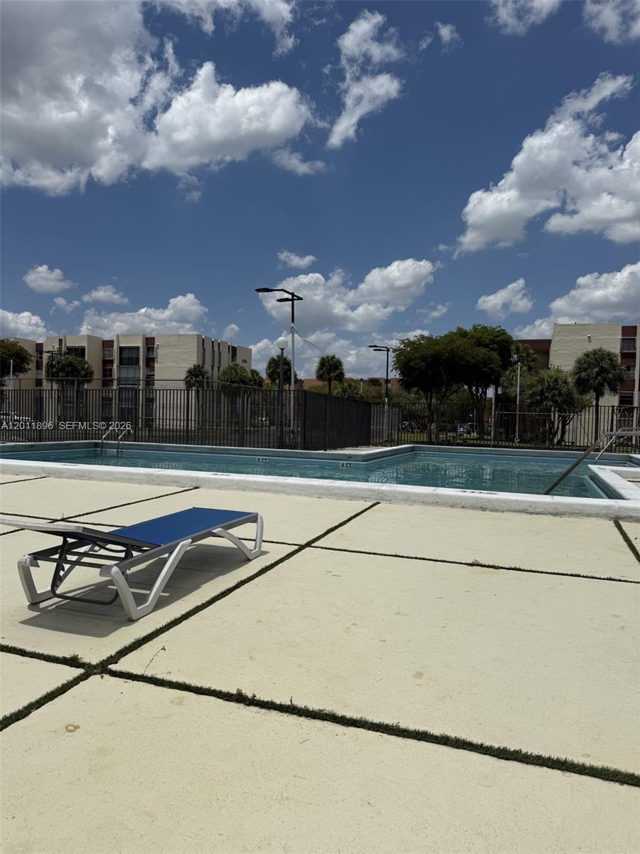 9411 Southwest 4th Street, Unit 111 Miami, FL 33174 - Photo 20 of 20 a view of a basket ball ground