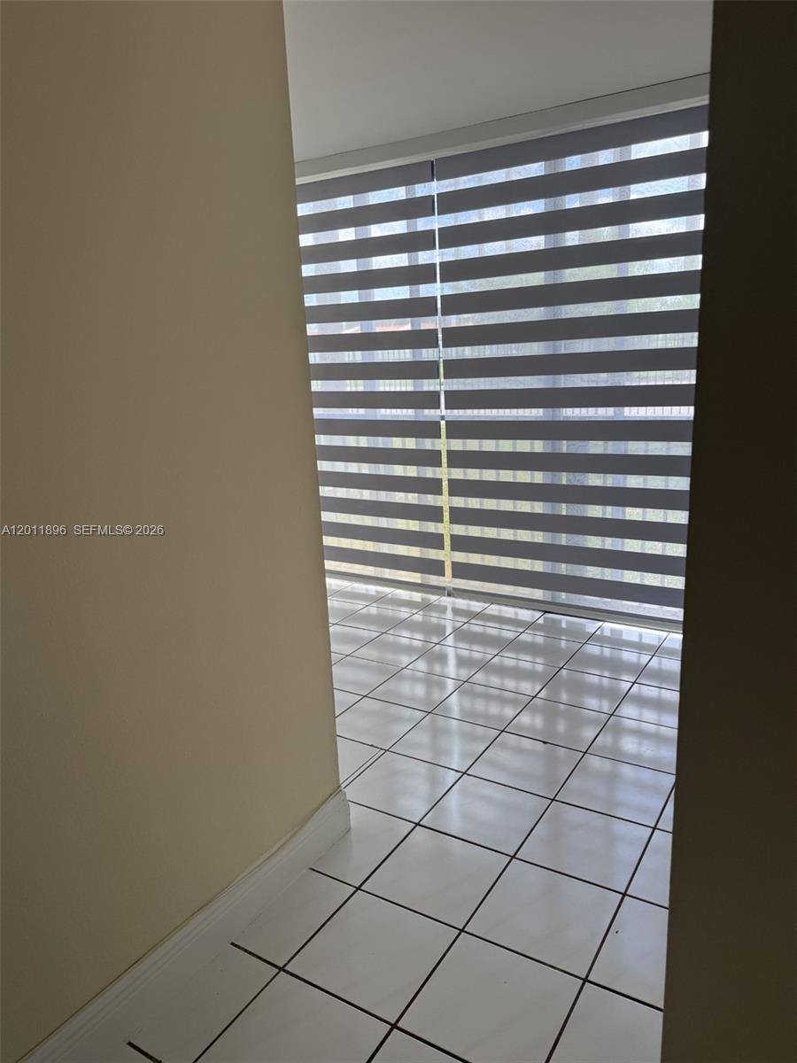 9411 Southwest 4th Street, Unit 111 Miami, FL 33174 - Photo 5 of 20 a bathroom with a shower