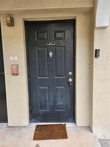 a view of entryway with a rug