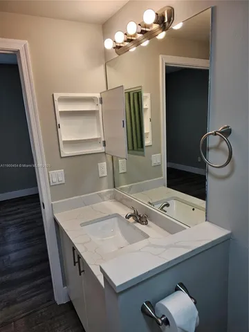 a view of wooden floor in an empty room