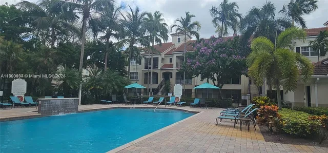 a view of house with outdoor seating space