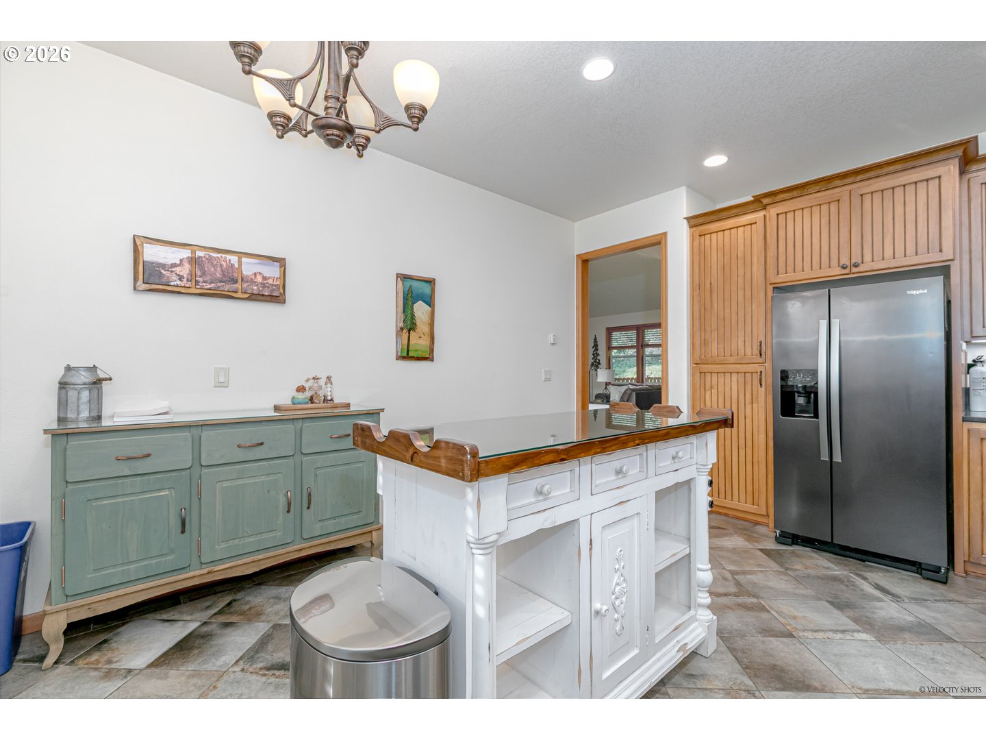 64636 Mc Intyre Road Rhododendron, OR 97049 - Photo 20 of 48 a kitchen with stainless steel appliances kitchen island granite countertop a refrigerator a stove a sink and dishwasher with wooden floor