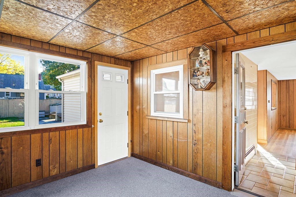 7 Roland Road Peabody, MA 01960 - Photo 11 of 24 a view of a entrance and room with furniture