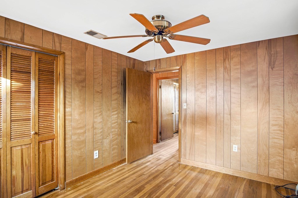 7 Roland Road Peabody, MA 01960 - Photo 16 of 24 a view of a hallway with a front door