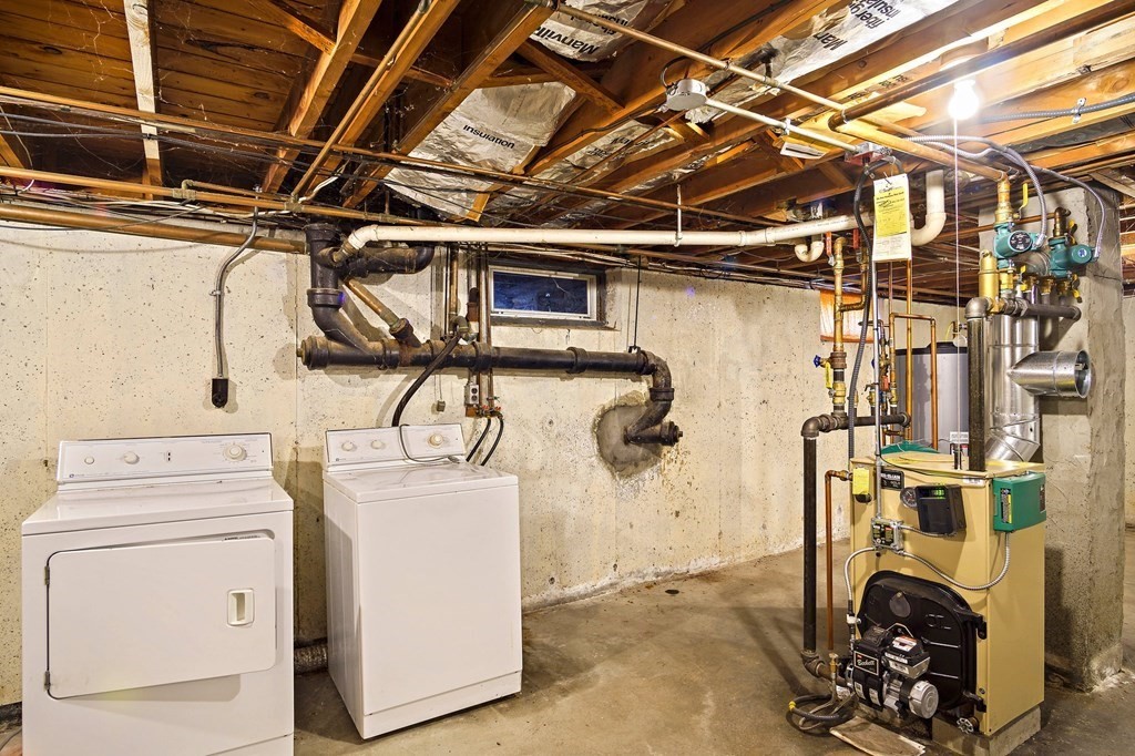 7 Roland Road Peabody, MA 01960 - Photo 21 of 24 a utility room with dryer and washer