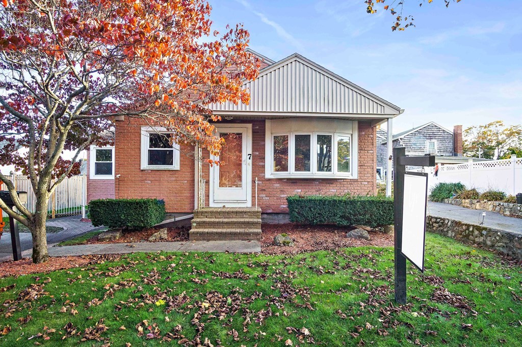 7 Roland Road Peabody, MA 01960 - Photo 24 of 24 a front view of a house with a yard