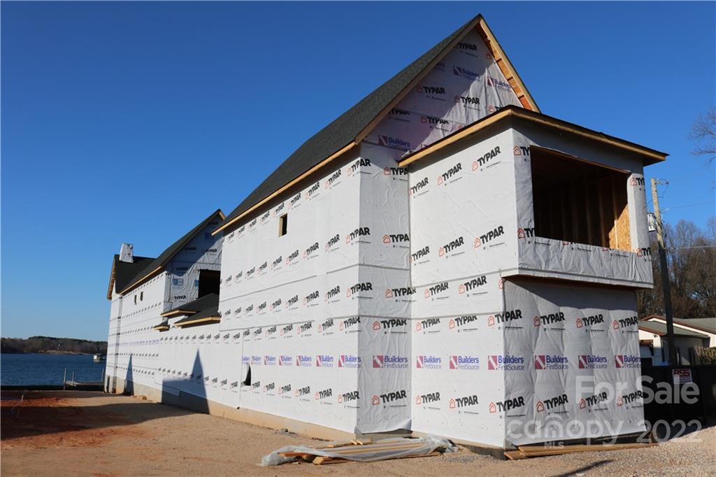17819 Largo Place Cornelius, NC 28031 - Photo 3 of 11 a front view of a house with a street