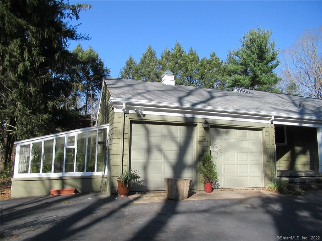 11 Burnt Swamp Road Woodbridge, CT 06525 - Photo 29 of 29 a front view of a house with a yard