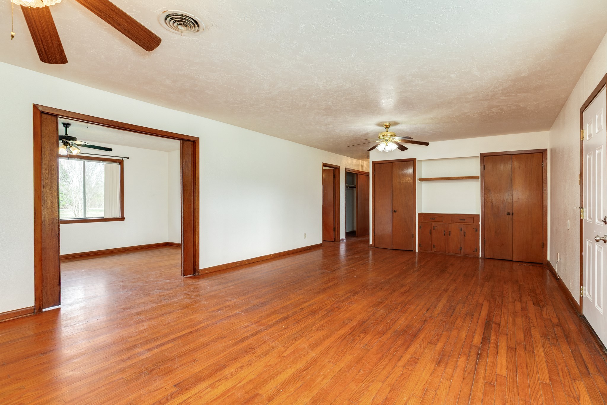 3702 Cedar Rapids Parkway Iowa Colony, TX 77583 - Photo 3 of 31 a view of an empty room with wooden floor