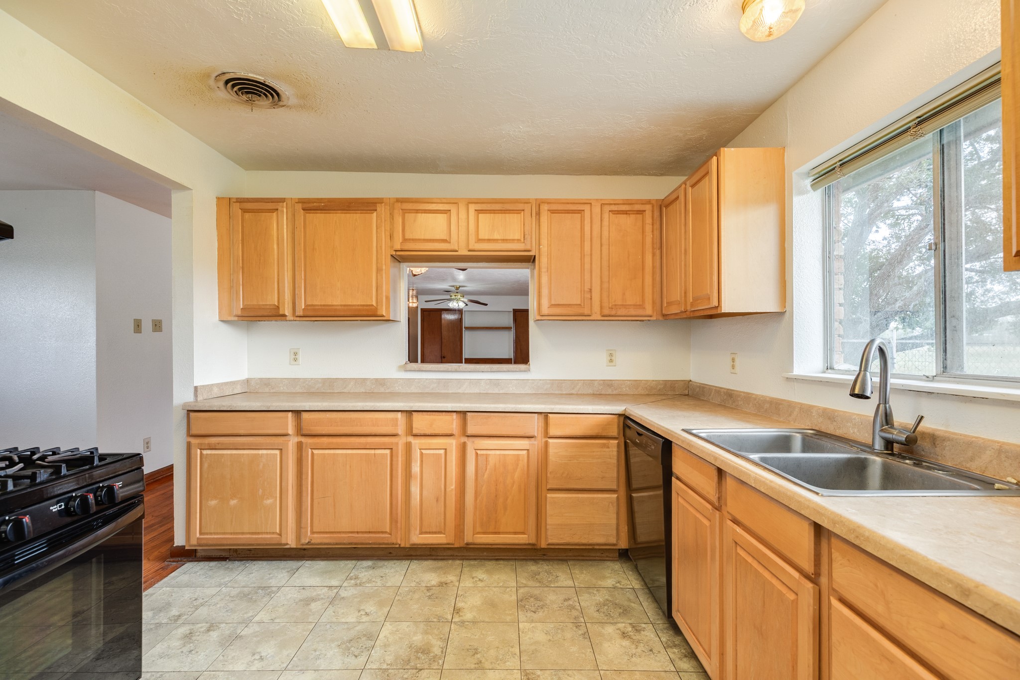 3702 Cedar Rapids Parkway Iowa Colony, TX 77583 - Photo 4 of 31 a kitchen with stainless steel appliances granite countertop a sink stove and cabinets