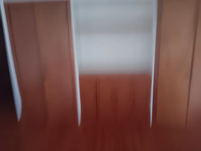 a view of outdoor space with deck and trees