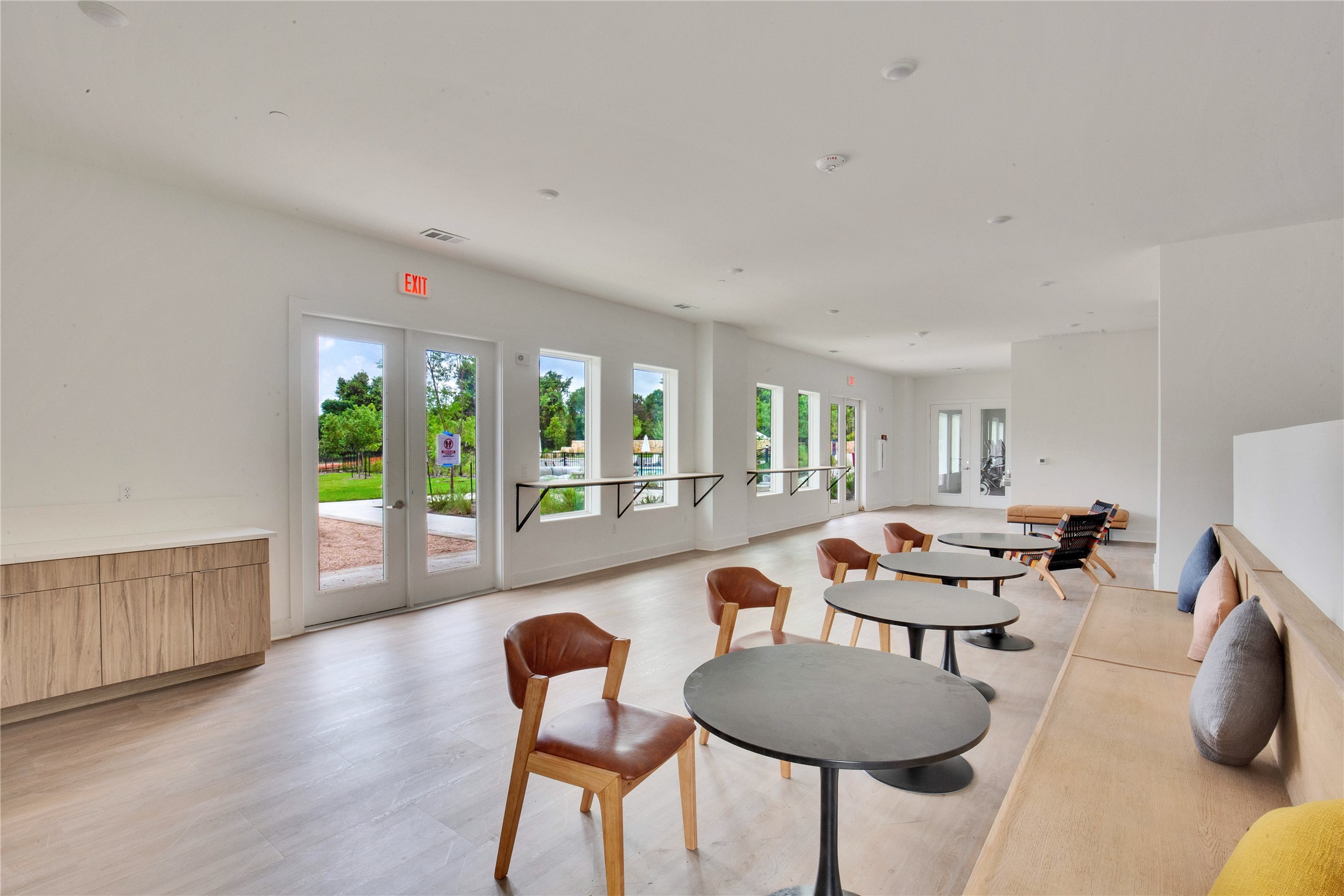 4802 South Congress Avenue, Unit 407 Austin, TX 78745 - Photo 19 of 25 a dining room with furniture and wooden floor